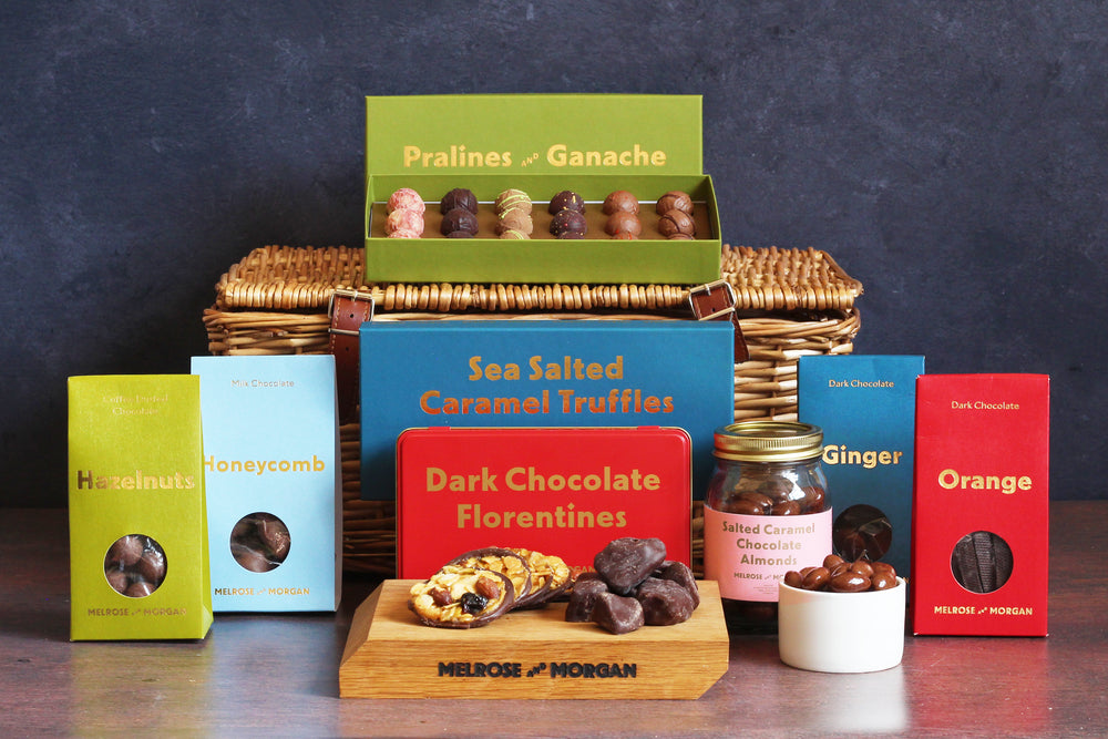 The Chocolatier Chocolate Hamper is designed for chocolate lovers everywhere. Enjoy a truly scrumptious array of our finest gourmet sweet treats such as truffles, florentines, chocolate covered fruit and nuts and honeycomb.