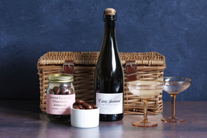 The Chocolate and Bubbles Hamper contains a bottle of the wonderful Ancestral Montonega Pet-Nat 2018 Can Sumoi with our best selling Salted Caramel Almond Jar, all beautifully wrapped and packaged in a signature Melrose and Morgan hamper box.